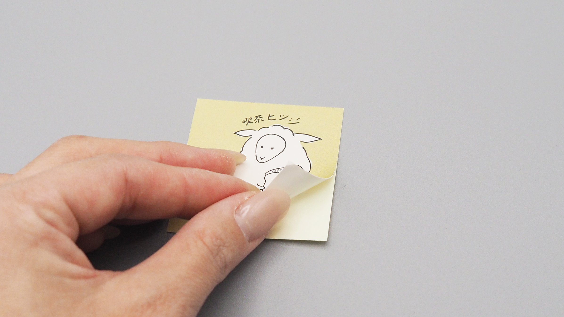 優しい色合いの、喫茶店のステッカー